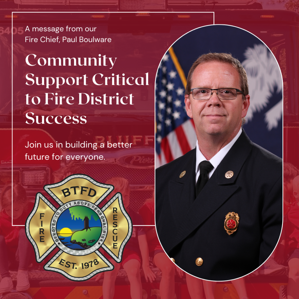 A fire chief in uniform stands beside a message about the importance of community support for fire district success, with a fire department badge and a background featuring a fire truck and an American flag.