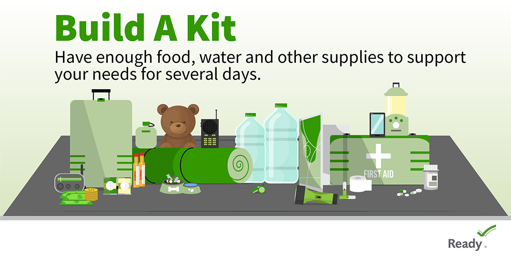 Illustration of emergency supplies on a table, including water bottles, canned food, flashlight, radio, first aid kit, batteries, medicine, hygiene items, a teddy bear, and a sleeping bag. Text: "Build A Kit" and instructions.